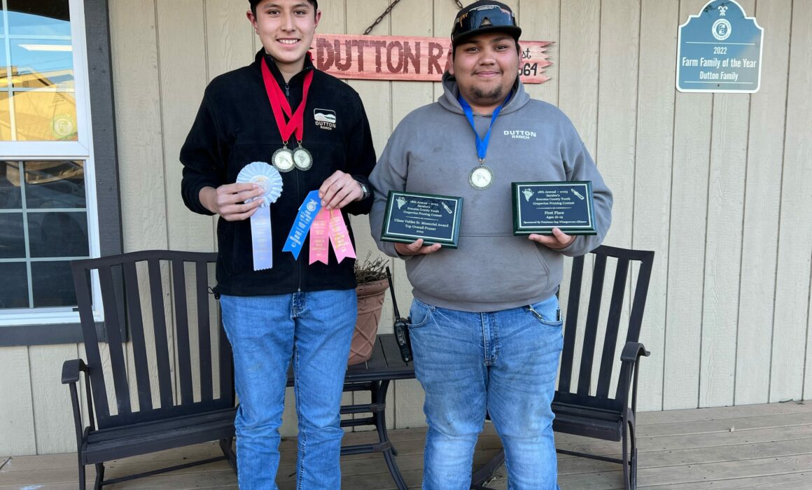 Young future farmers holding awards