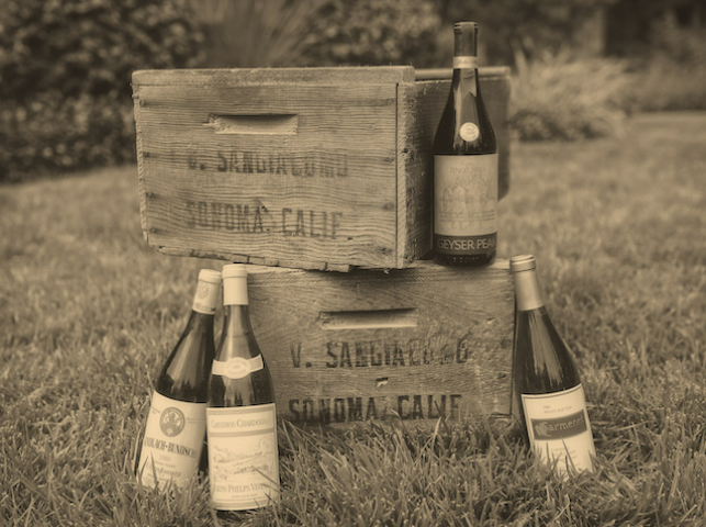 Two wooden crates and 4 bottles of wine