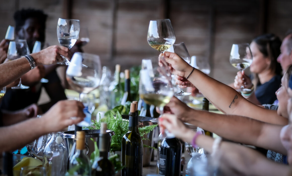 People toasting each other over a table